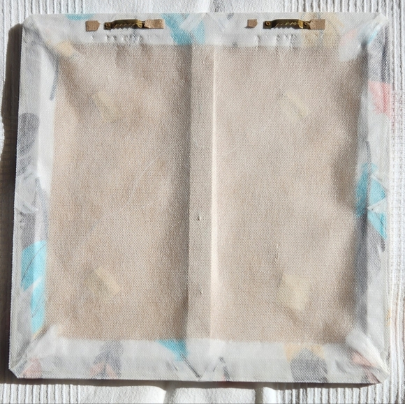 Wayfair photo holder with whimsical multicolored feathers. - Picture 2 of 3